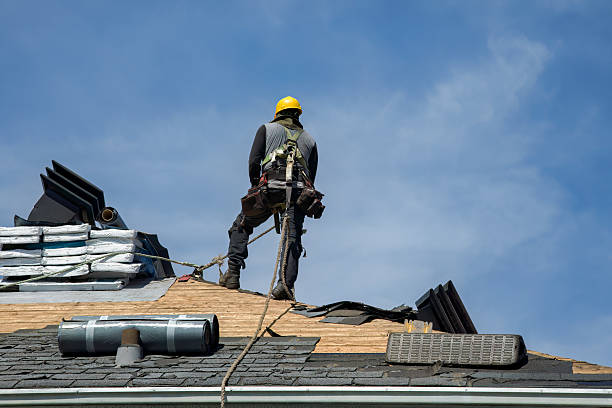 Professional Roofing technician working in College Point, NY